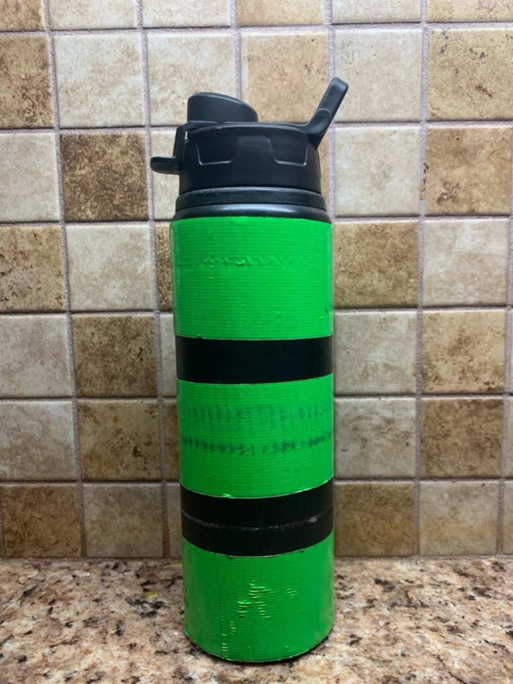 Green Stainless Steel Water Bottle Wrapped with Black Strips. 20oz Insulated.